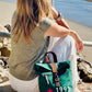 Sac à dos en tissu vert ou bleu