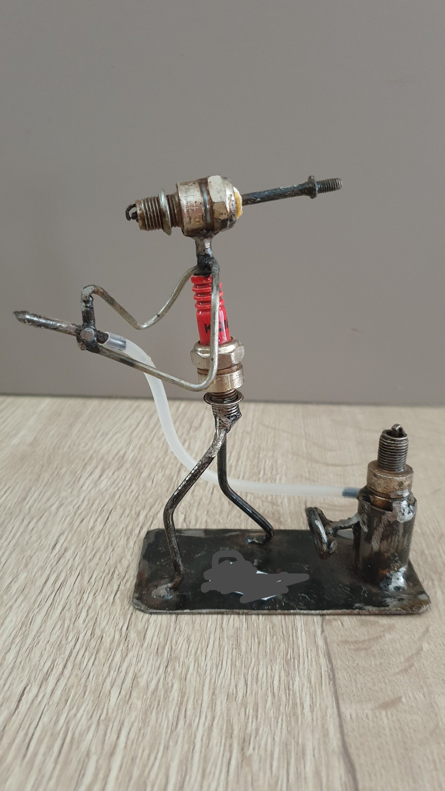 Figurines with candles and recycled materials