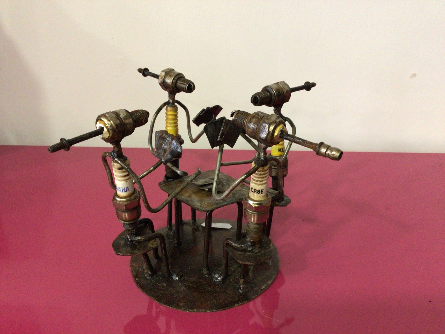 Figurines with candles and recycled materials